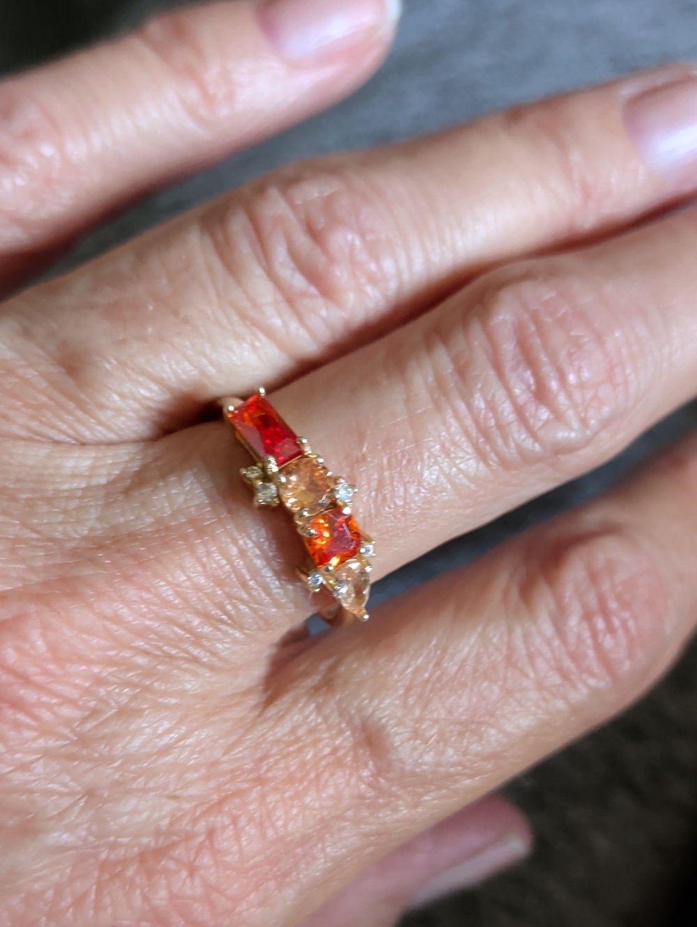 Gold Ring with Red and Orange Gemstones
